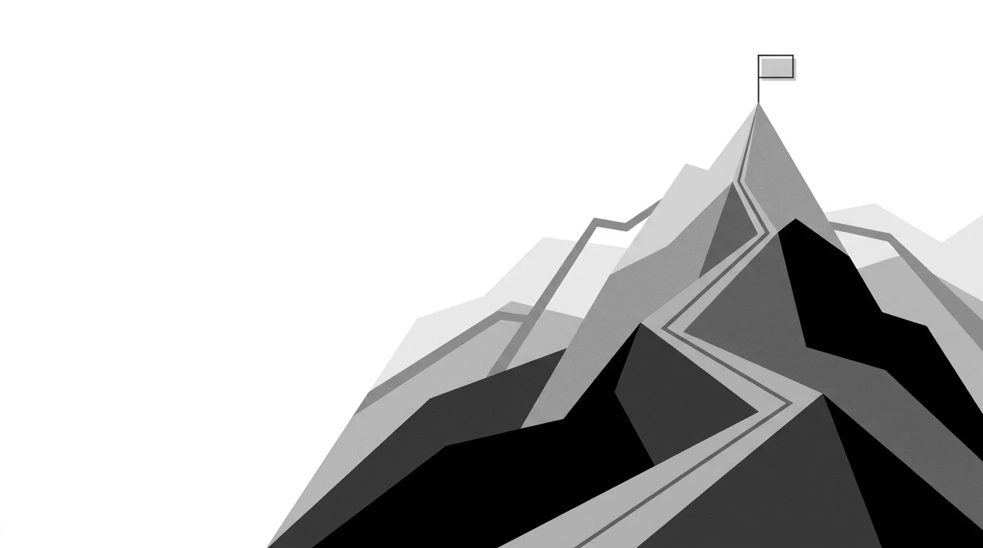 A path zigzagging to a summit flag